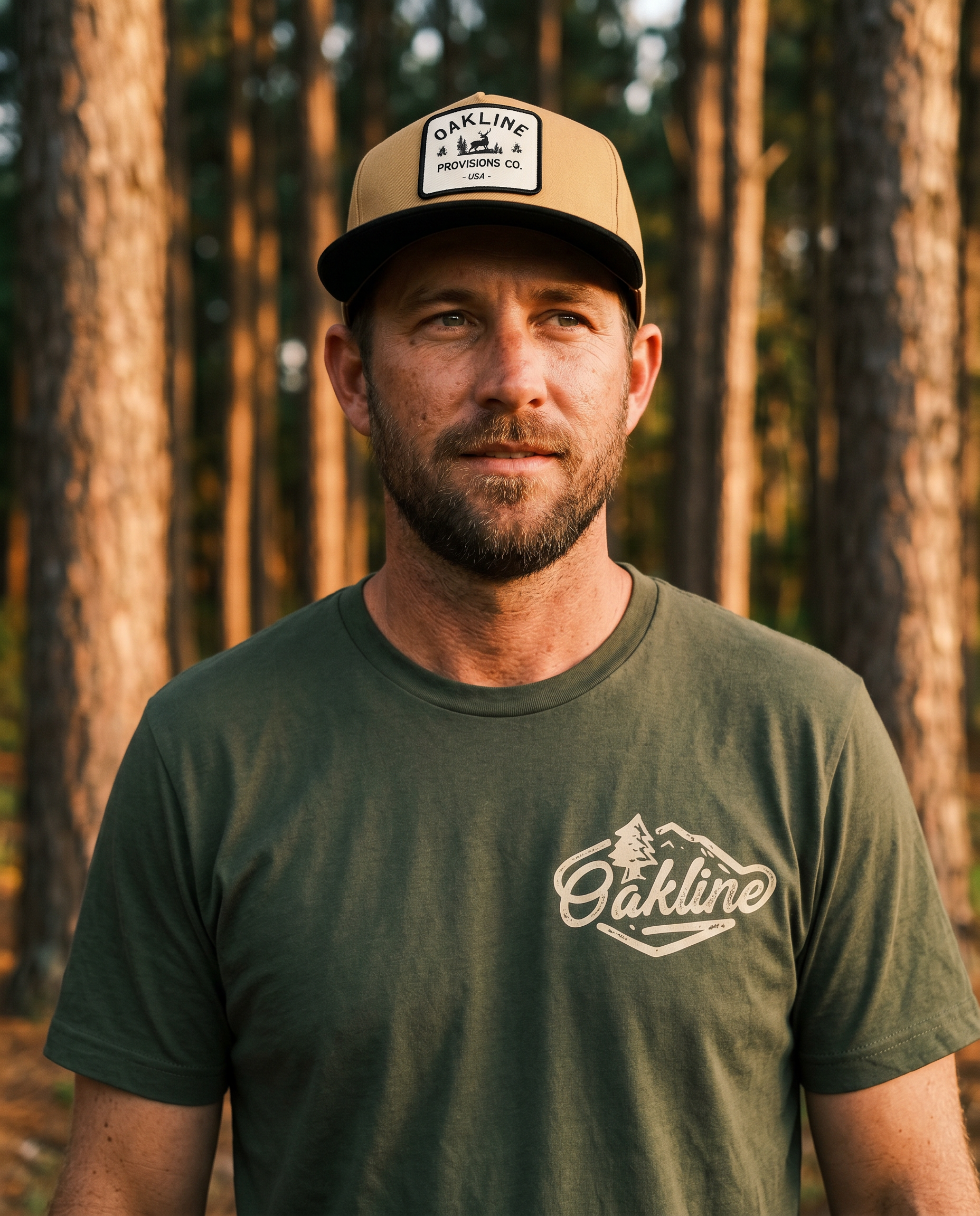 Model wearing The Field Kit — Buck Patch cap + Dark Green tee
